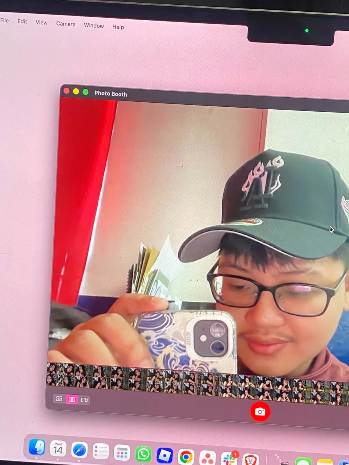 Justine wearing a cap